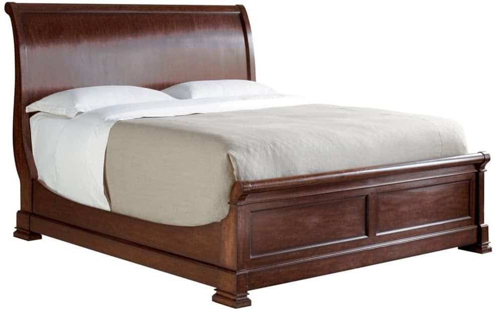When comparing a sleigh bed vs. canopy bed, a sleigh bed is more traditional and ornate.