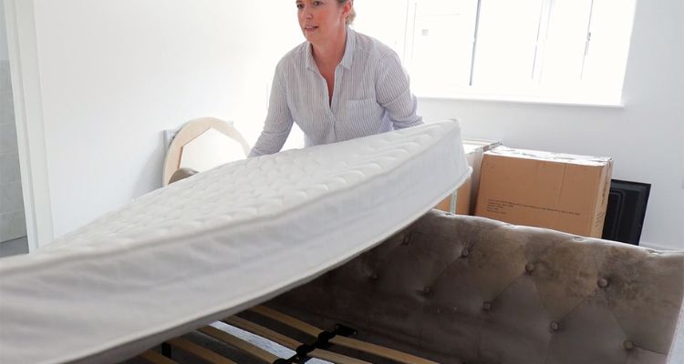 What’s the Best Way to Lift a Heavy Mattress to Make a Bed