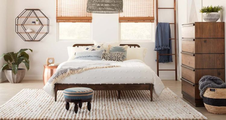 how to place a rug under a bed