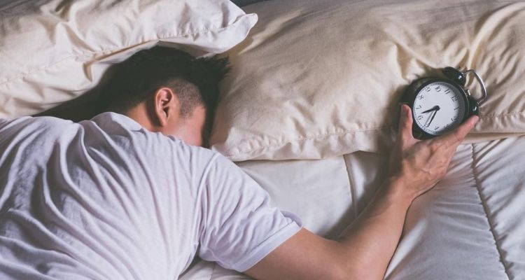 how to wake someone up who is a heavy sleeper