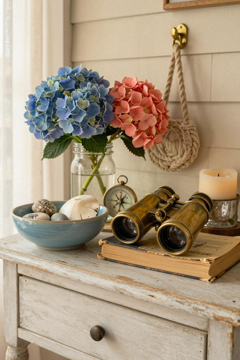 Coastal Cottage styling detail with vintage brass and hydrangeas