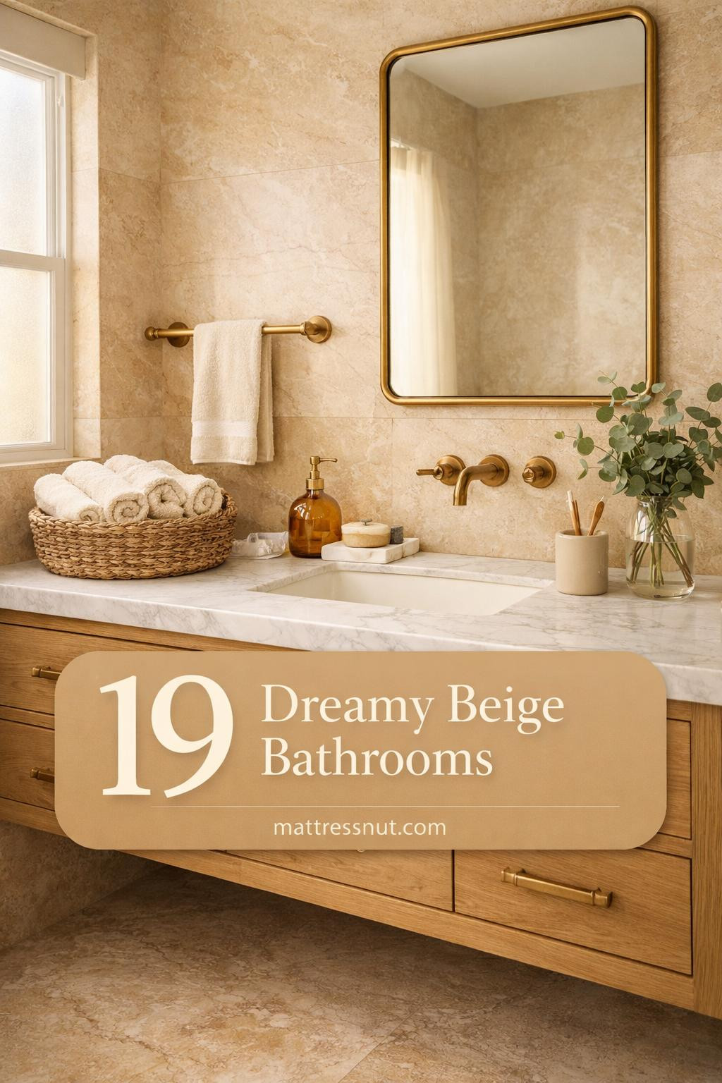 Warm beige bathroom with natural stone tiles, brass fixtures, white vanity, and soft ambient lighting
