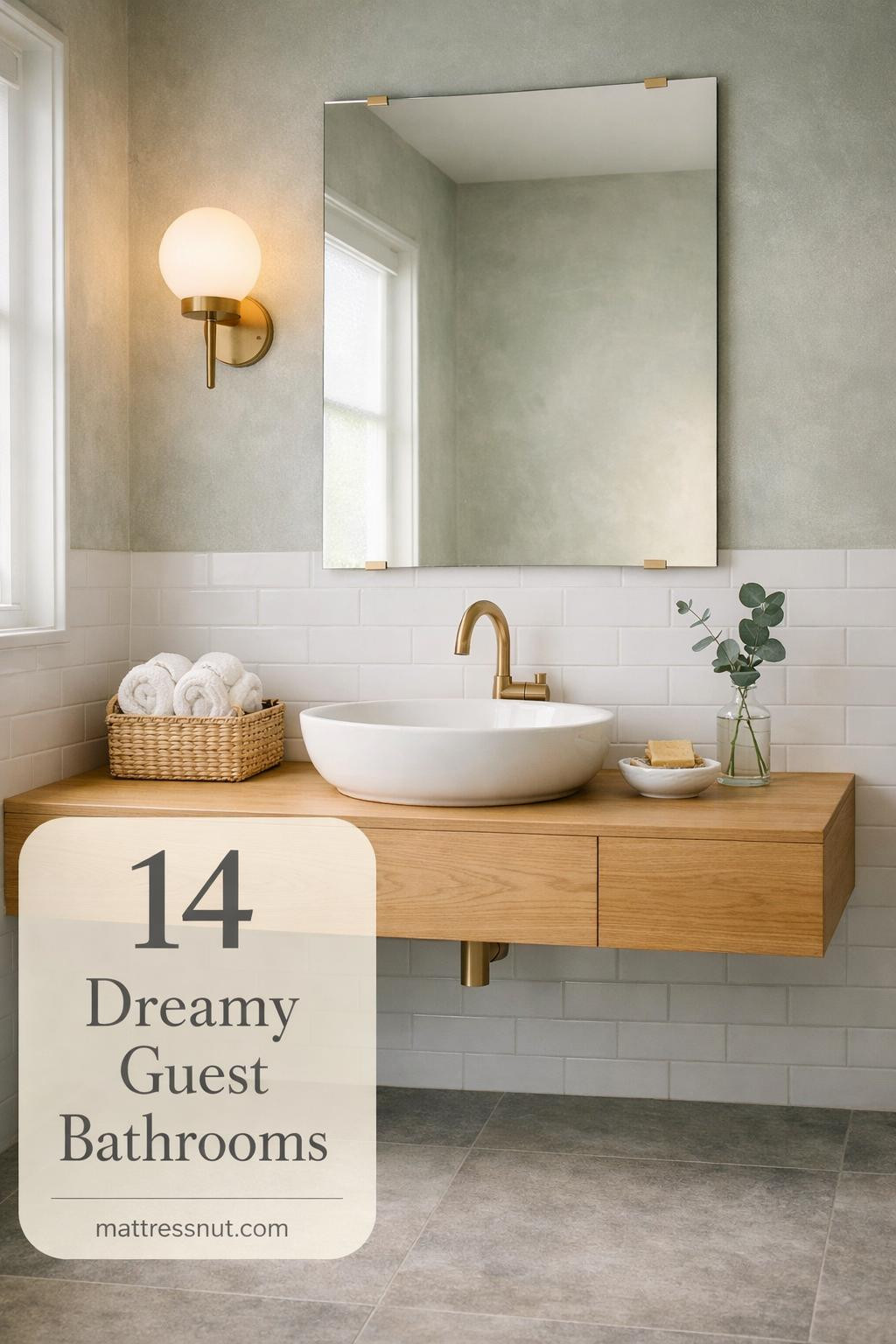 Minimalist guest bathroom with white subway tiles, natural wood vanity, brass fixtures, and soft linen towels