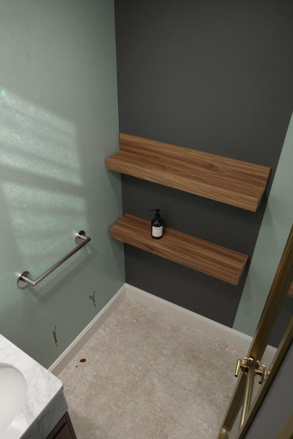 pale jade bathroom color palette with mother-of-pearl dust and matte charcoal accent wall behind floating walnut shelving
