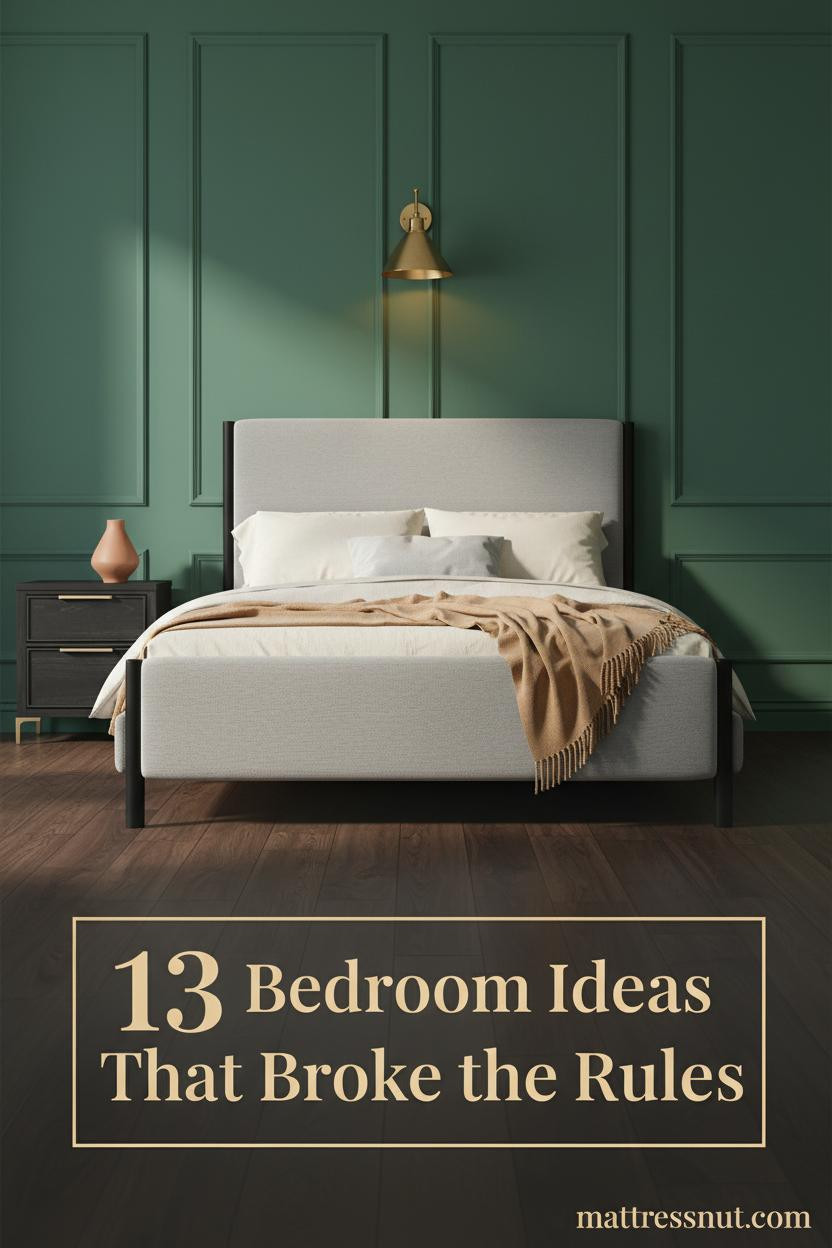 Black metal bed frame against deep forest green board-and-batten wall, dark walnut floors, cream linen bedding, brass sconce, camel throw