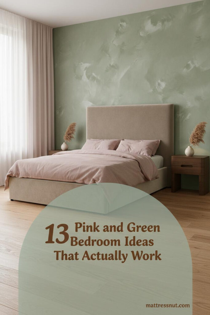 Sage green limewash accent wall with blush linen duvet on oak bed frame, dried stem vase on nightstand, warm morning light