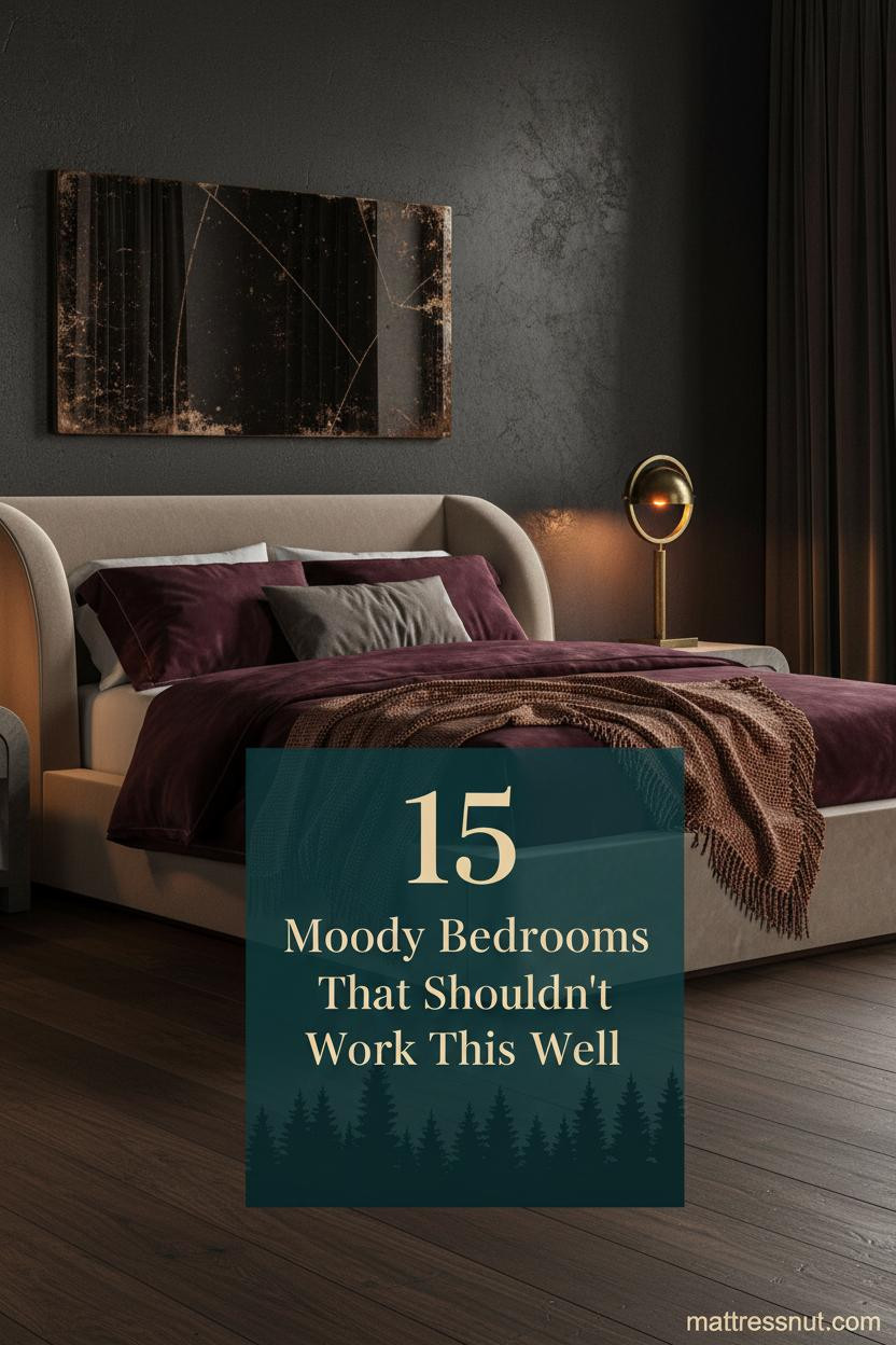 Dark charcoal plaster bedroom with burgundy velvet bedding, rust wool throw, aged bronze mirror, and warm amber lamp casting a 2400K moody glow