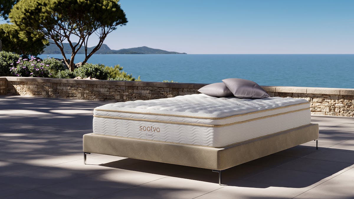 Saatva Classic mattress in a bedroom setting - luxury innerspring hybrid