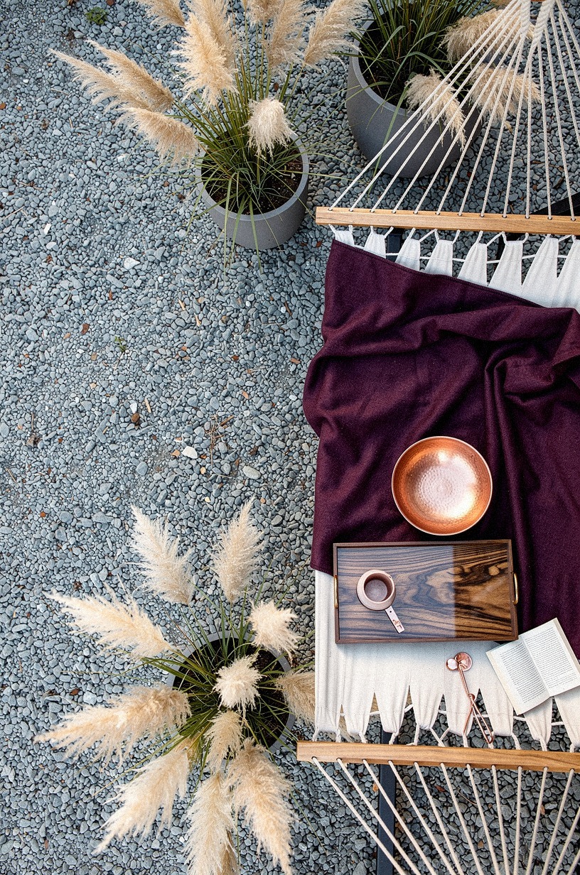 Frame the hammock with potted pampas grass