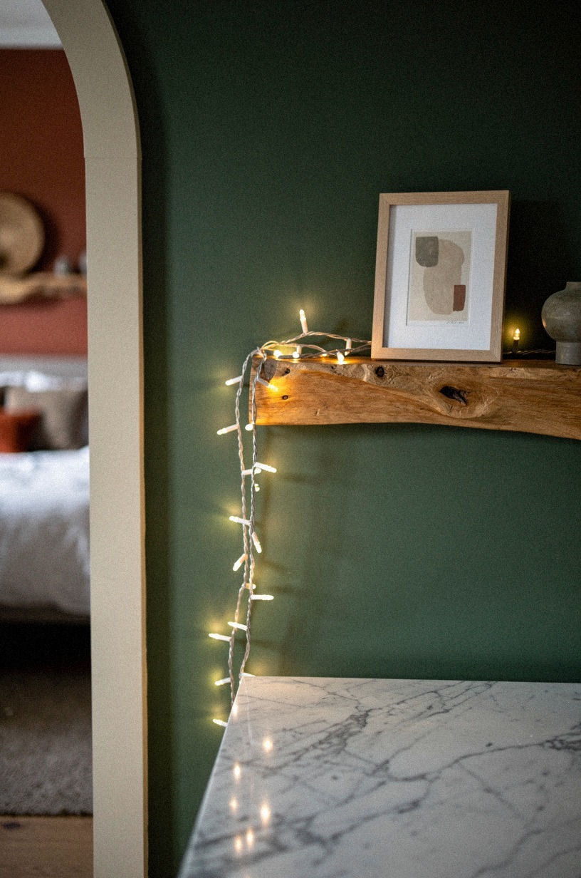 Drape fairy lights along a shelf or beam
