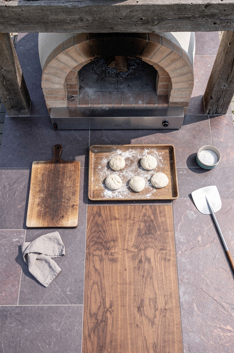 Frame the oven arch with reclaimed timber beams