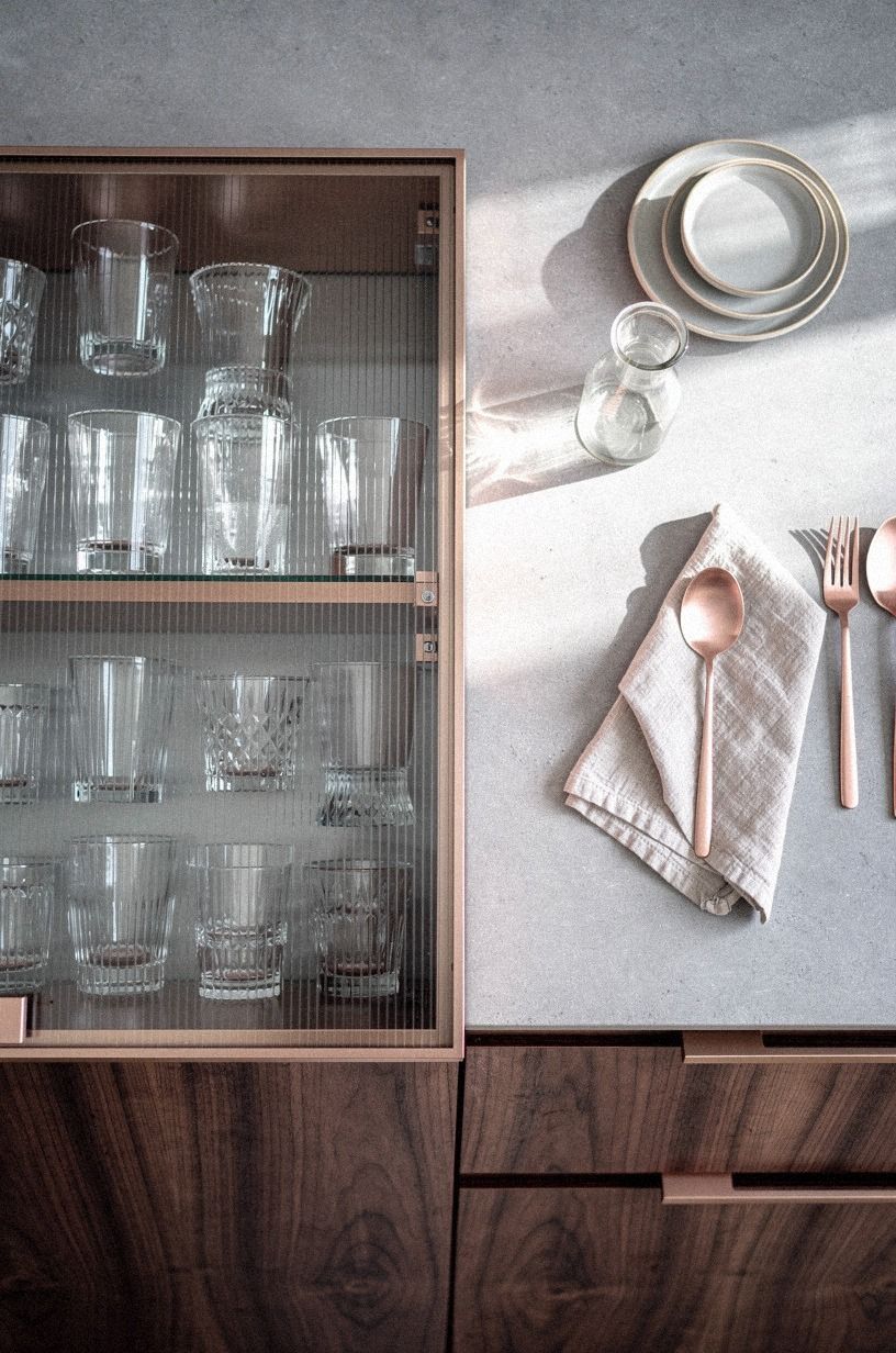 Style everyday glasses behind ribbed glass doors