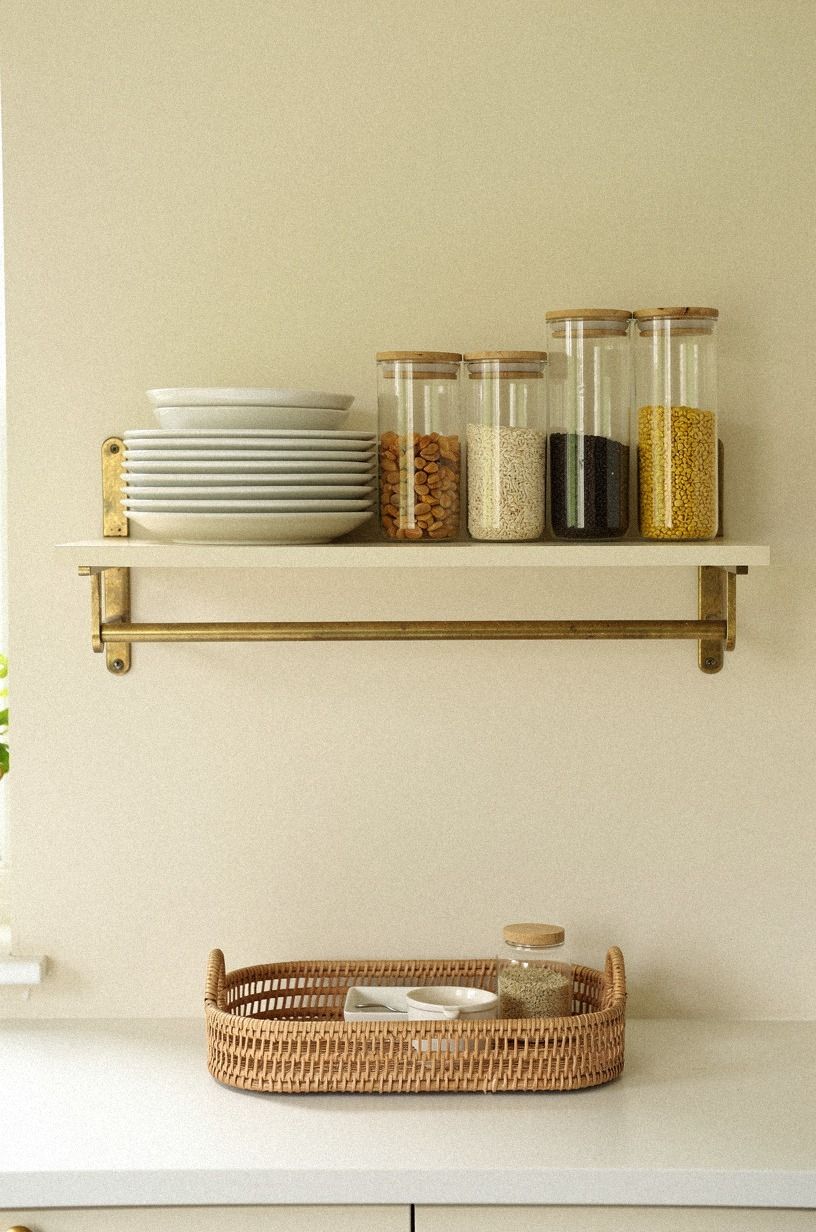Layer plates behind glass storage jars