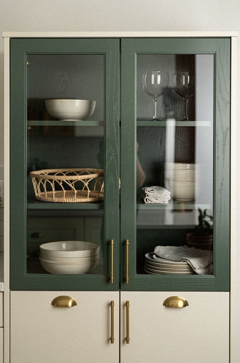 Paint cabinet backs a moody forest green