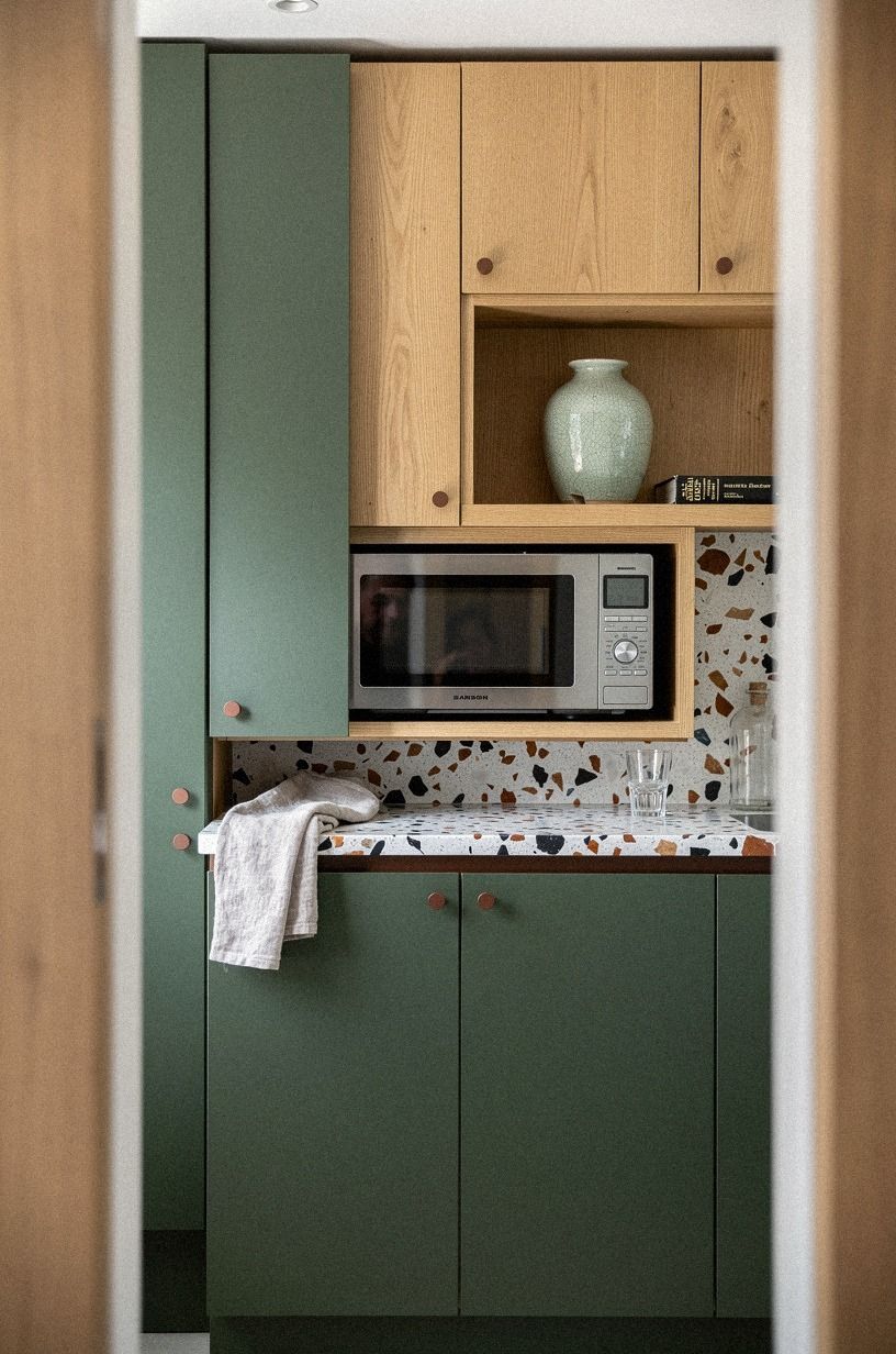 I hid the microwave behind pocket doors