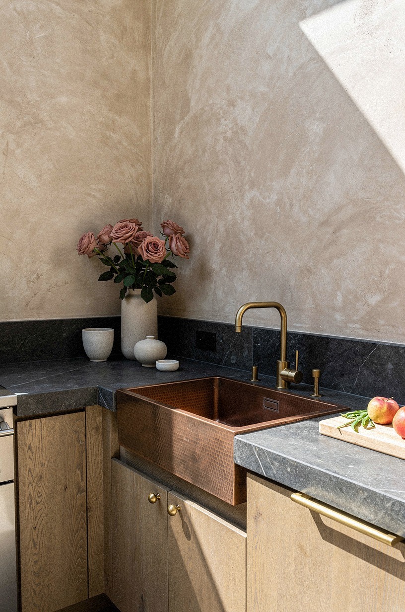 Add a hammered copper sink in stone