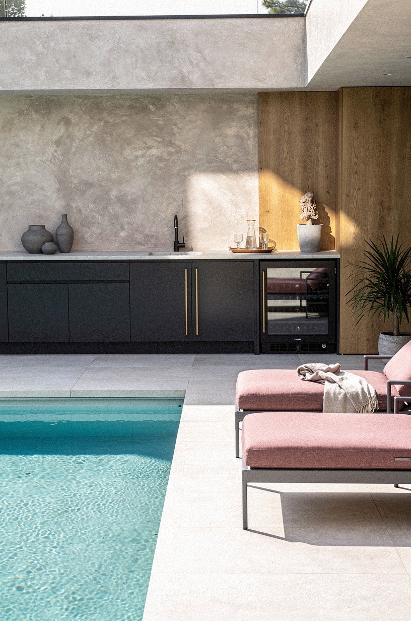 Place the fridge beside the lounge chairs