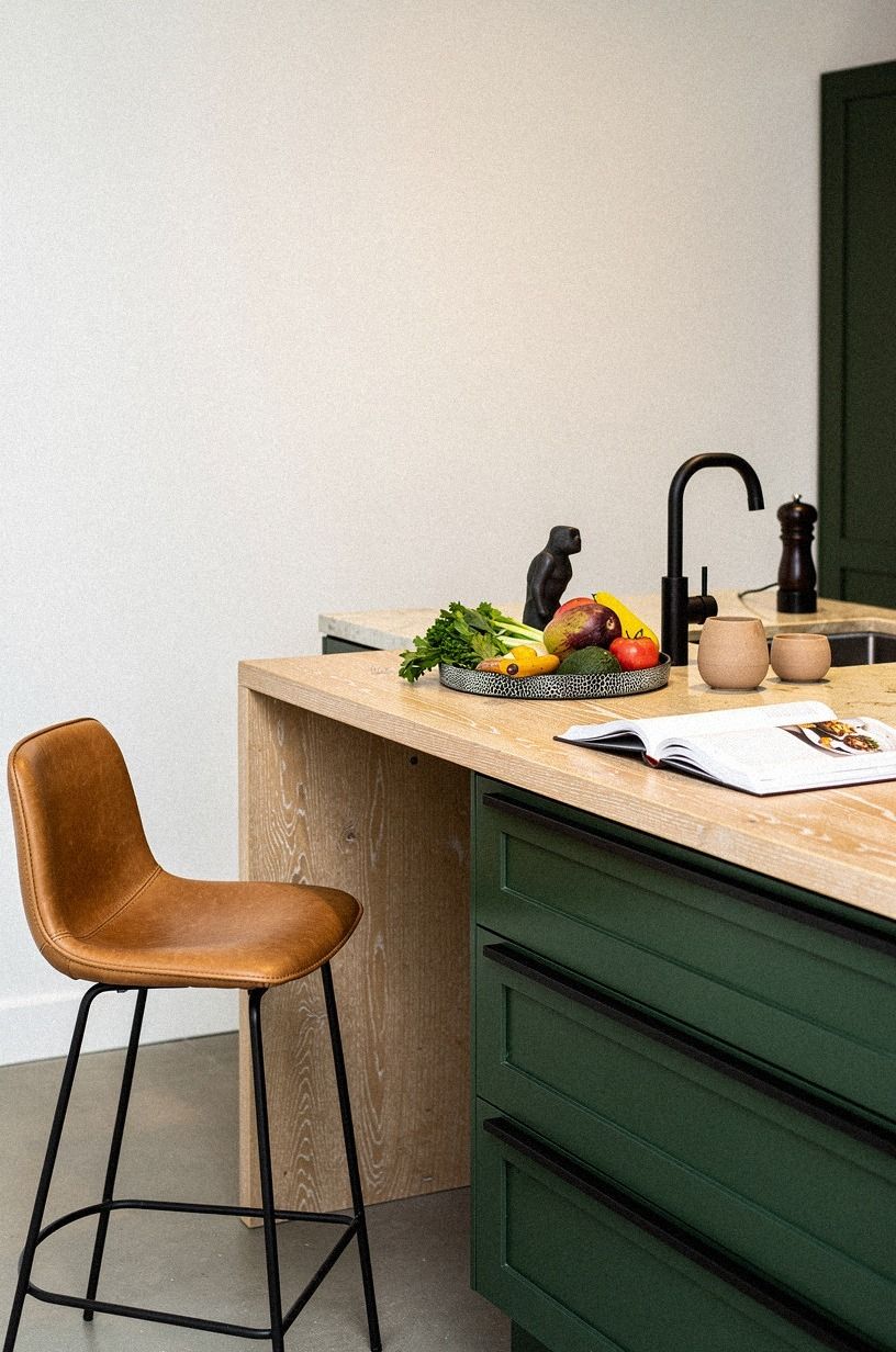 Pair green drawers with creamy stone counters
