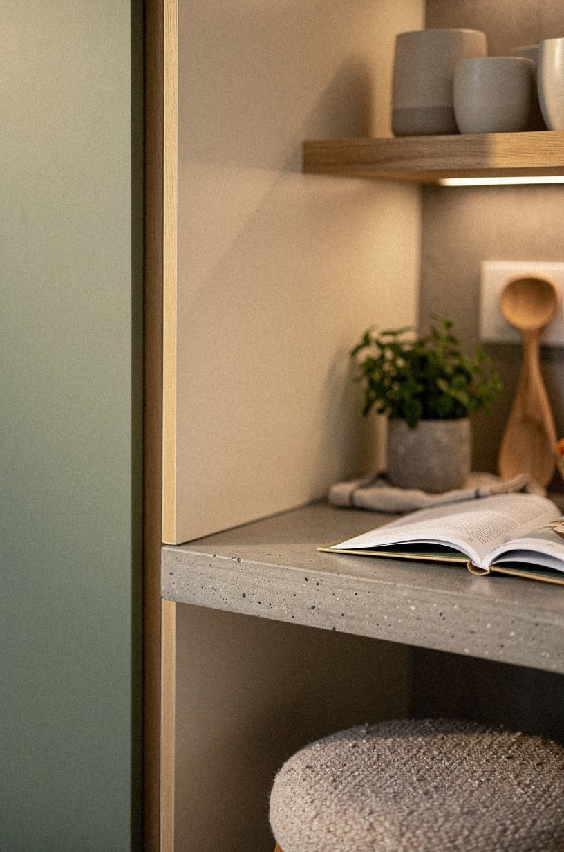 Float oak shelves between tall cabinet blocks