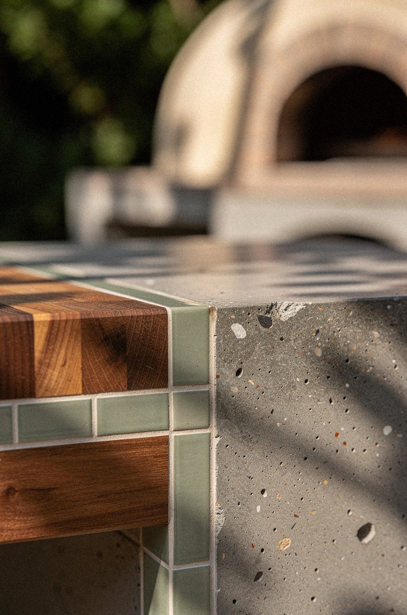 Add butcher block beside the pizza oven