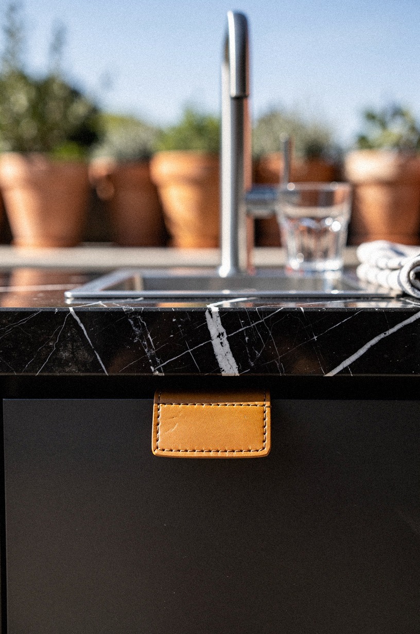 Set a glass rinser beside the outdoor bar tap