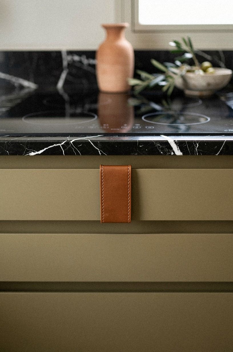 Stack shallow drawers under the cooktop