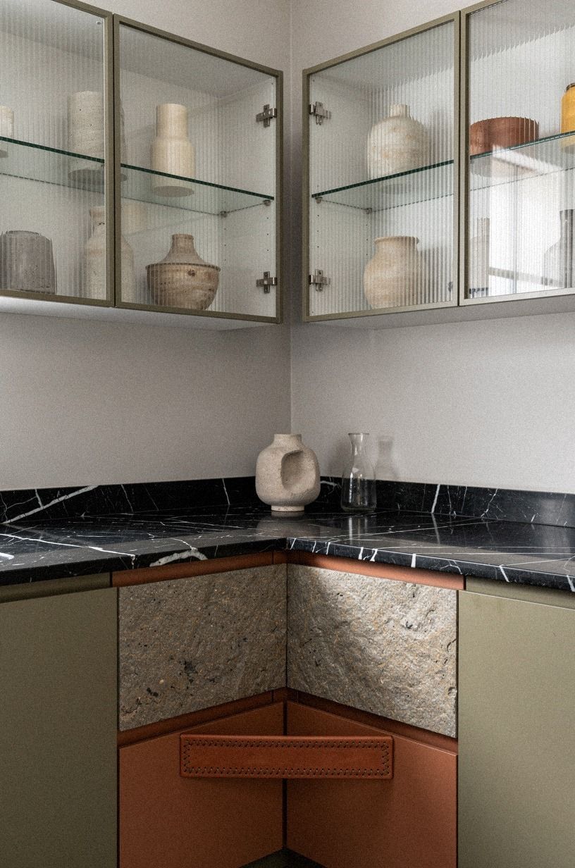Run open cubbies above the corner cabinet