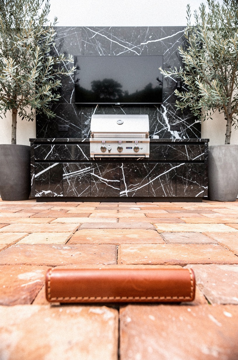 Layer pavers toward the cooking bar
