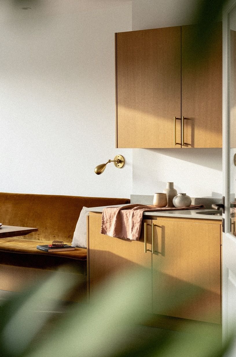 Balance honey oak with matte white walls
