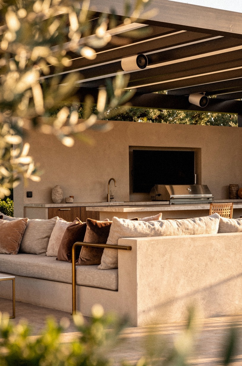 Tuck speakers into the pergola beams