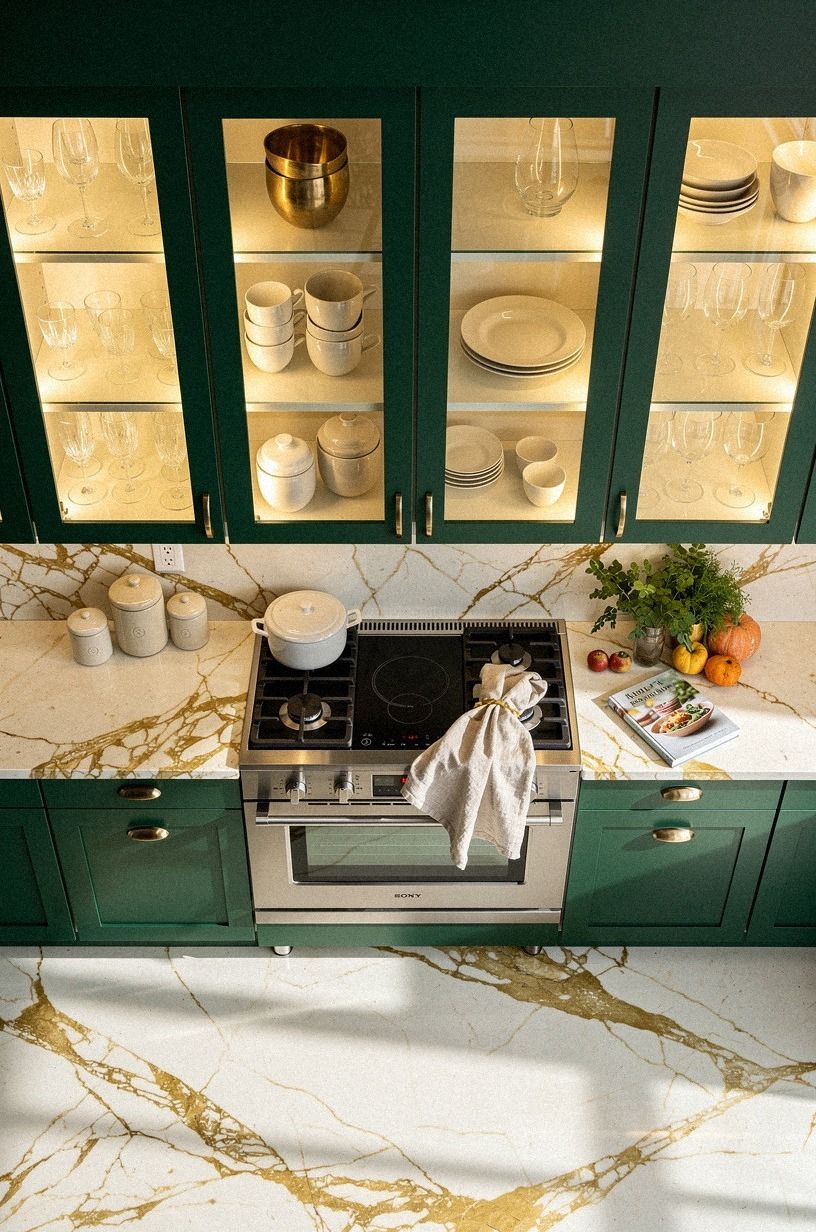Wrap the range wall with lit glass cabinets