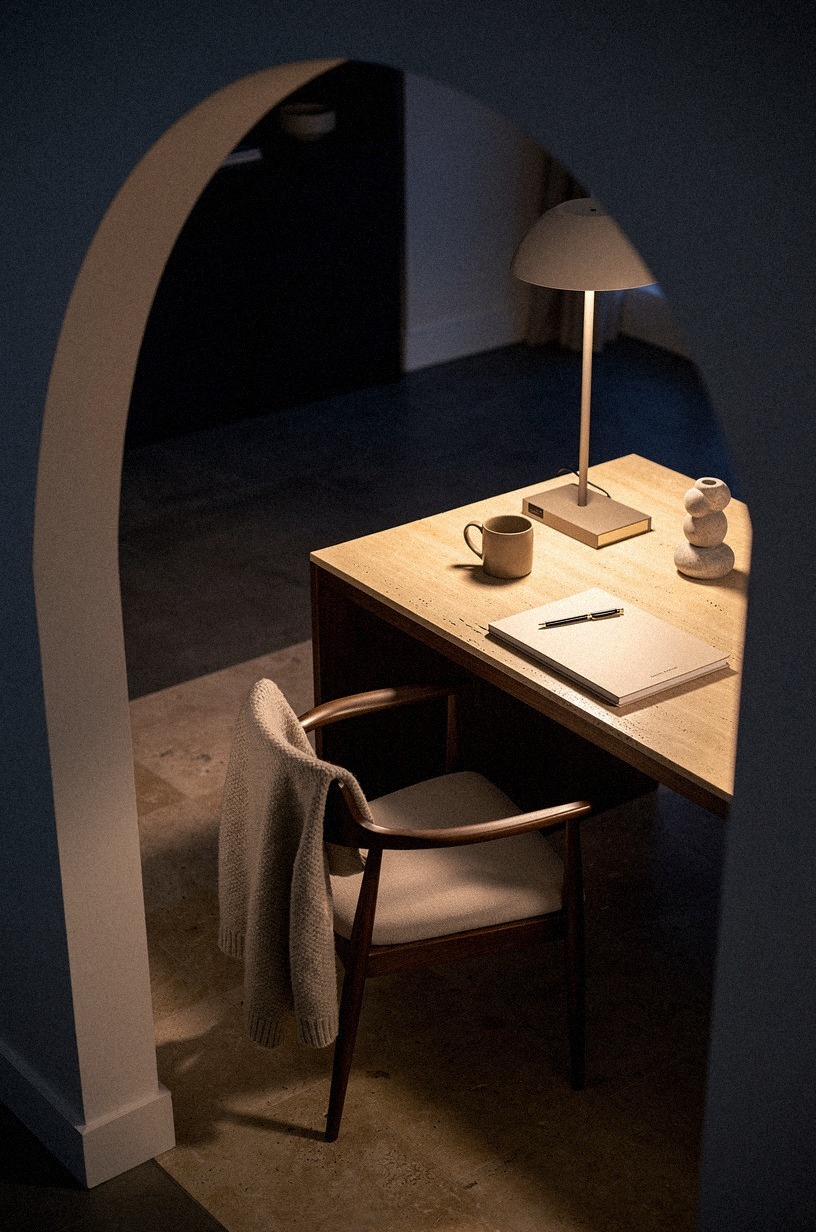 Swap the desk chair for something with timber arms