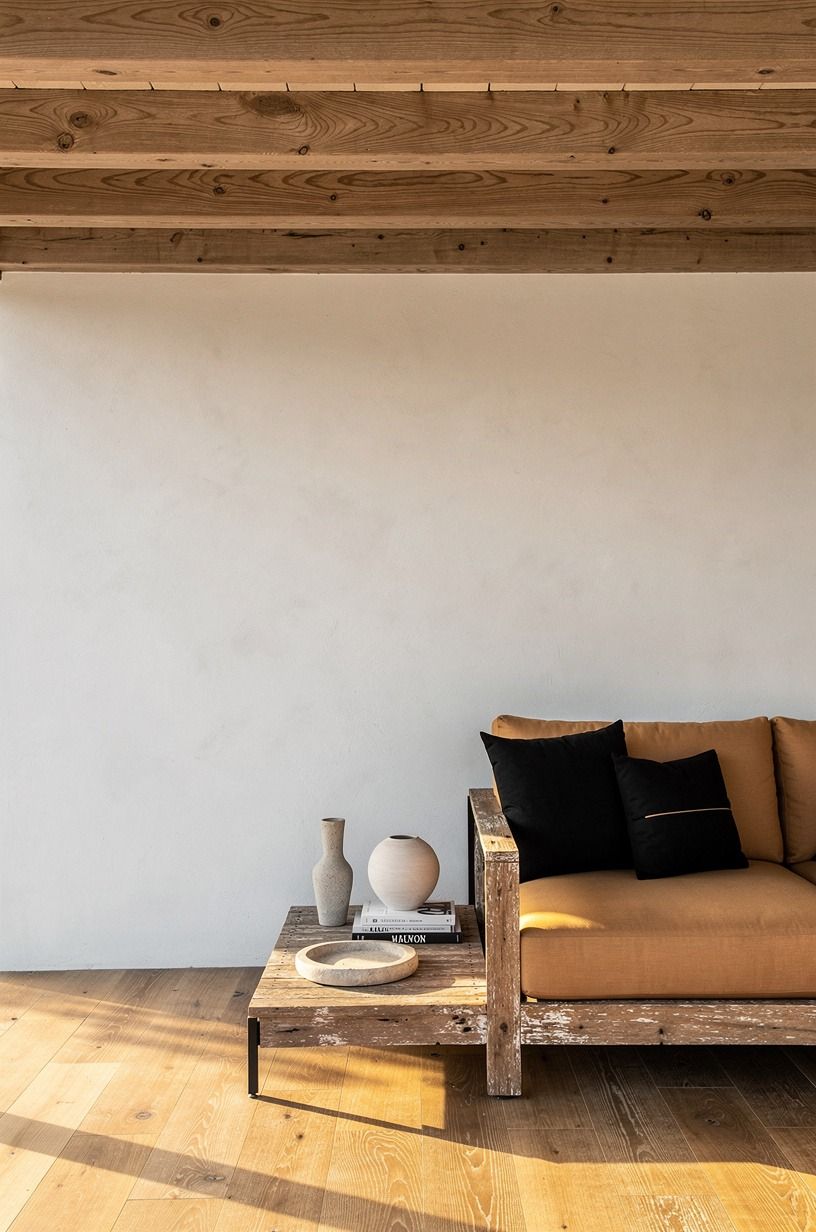 Run cedar beams across the covered patio ceiling