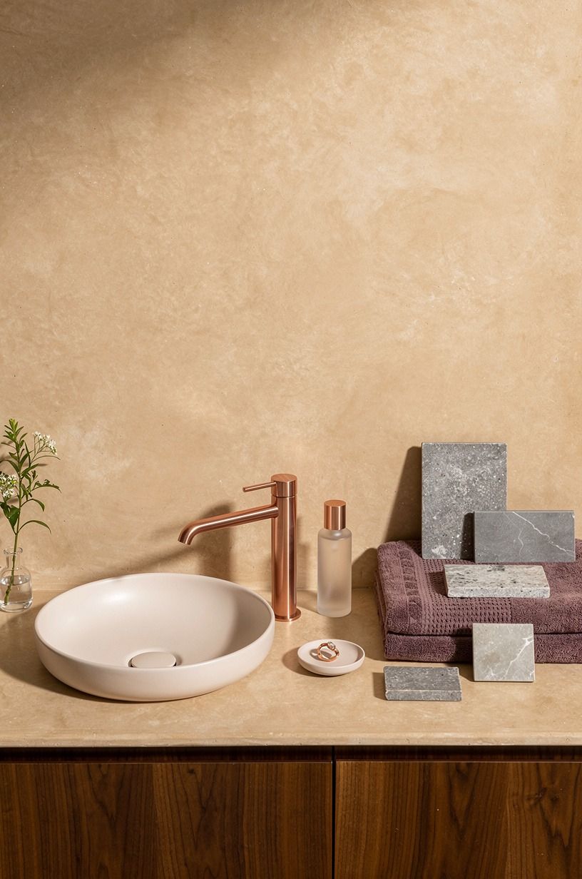 Tint tadelakt vanity walls with warm sand