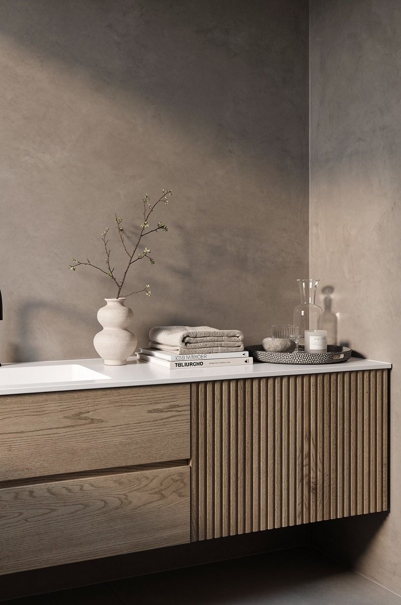 Pair taupe microcement with fluted oak
