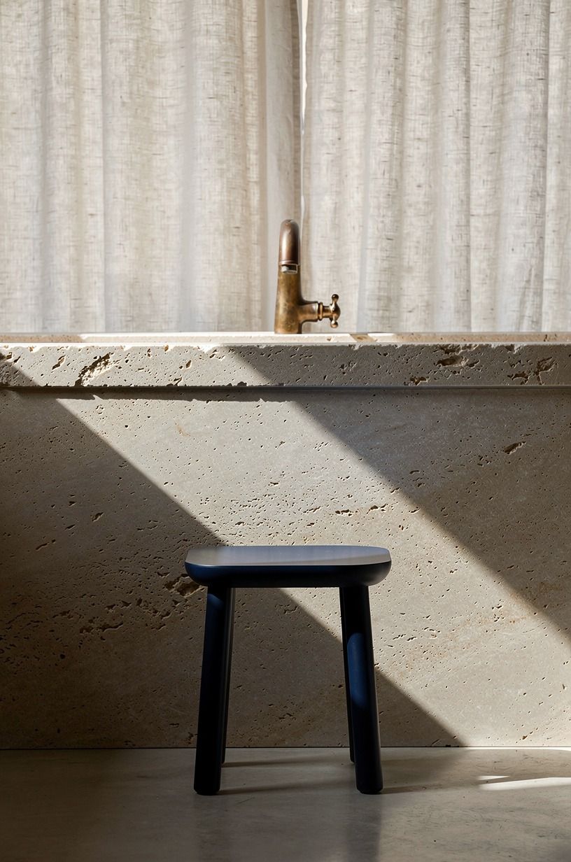 Cap the half-wall with a thick limestone ledge