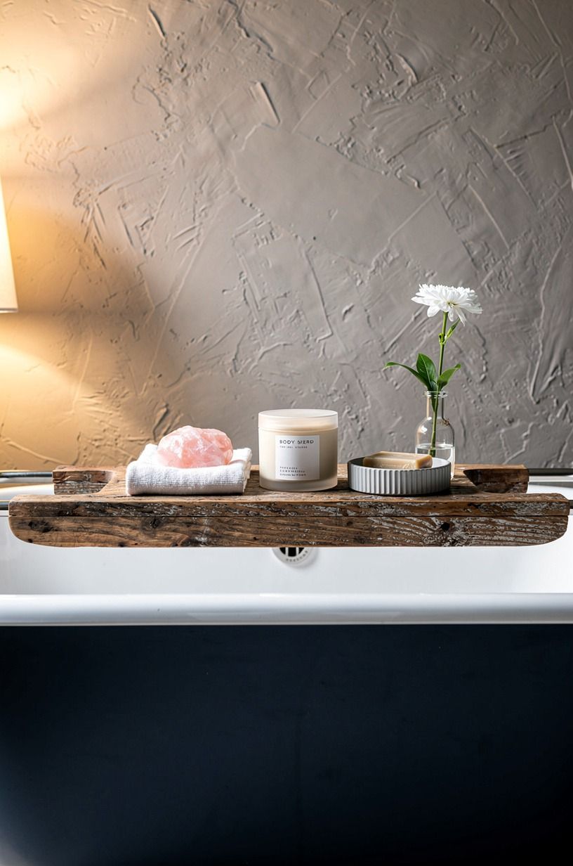 Arrange rose quartz beside body butter