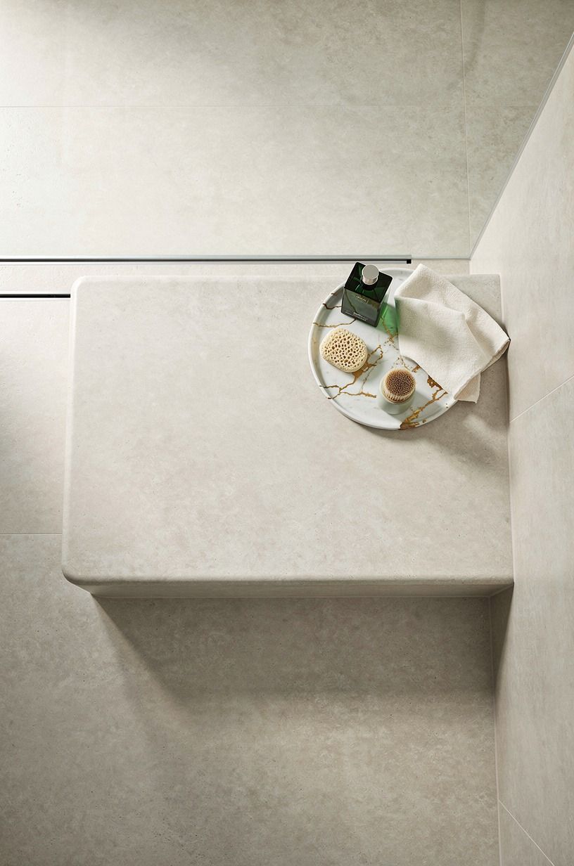 Create a monolithic microcement shower bench