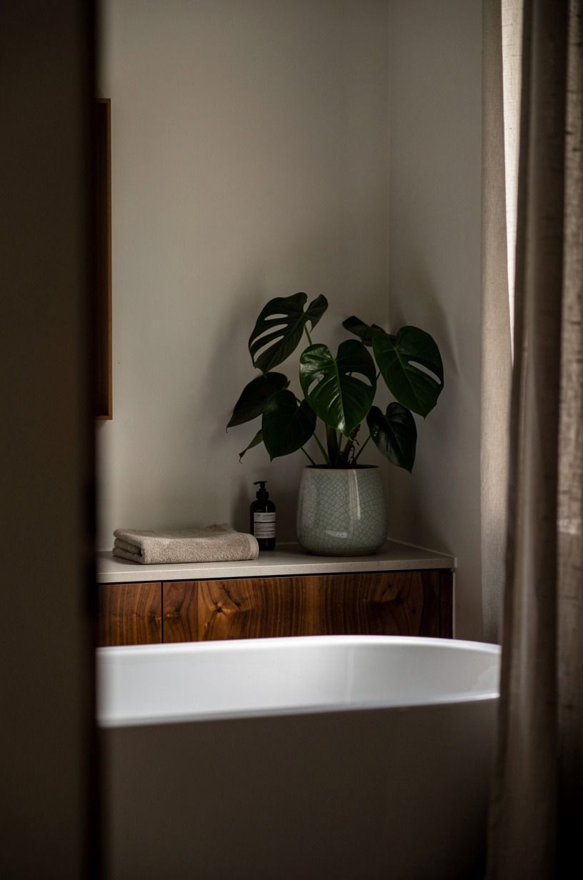Style a bathtub corner with glossy philodendron