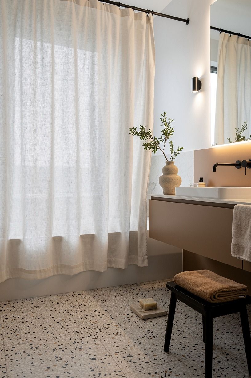 Hang a linen shower curtain instead of plastic