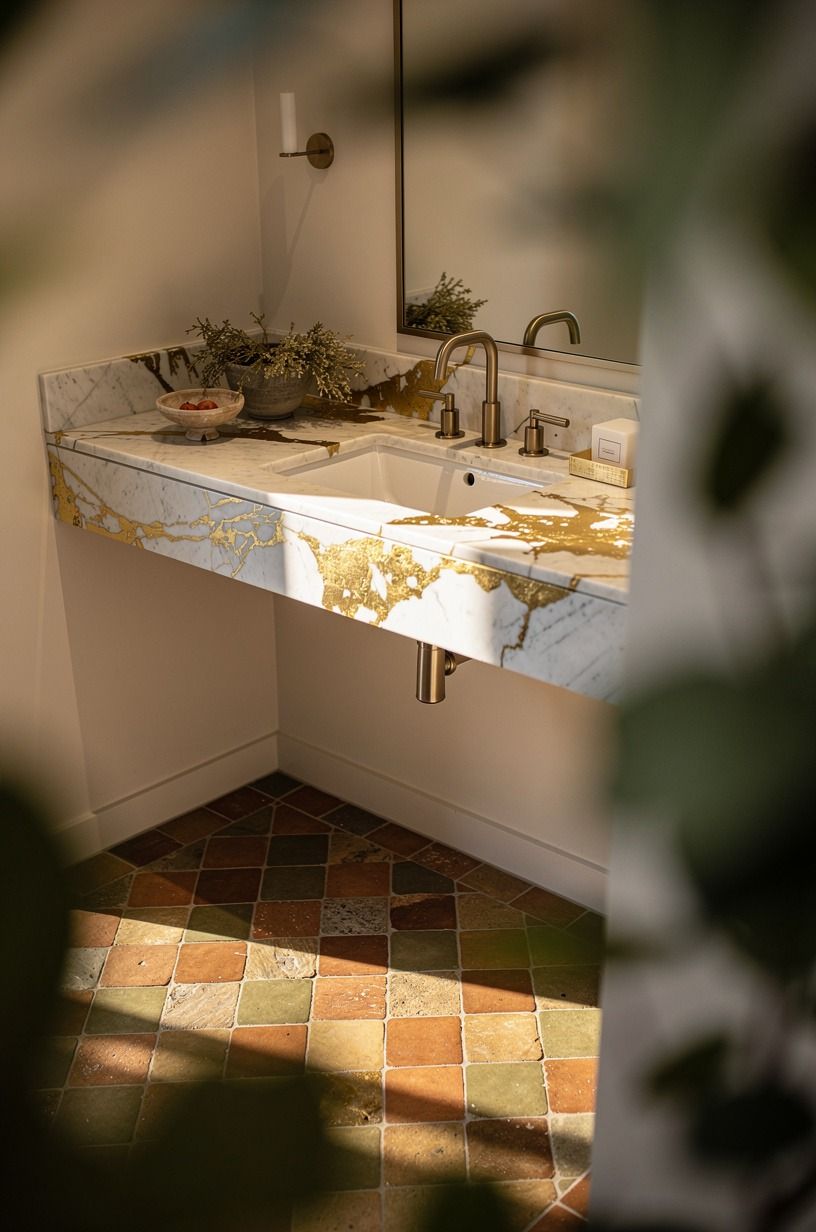 Use zellige on the floor of a small powder room