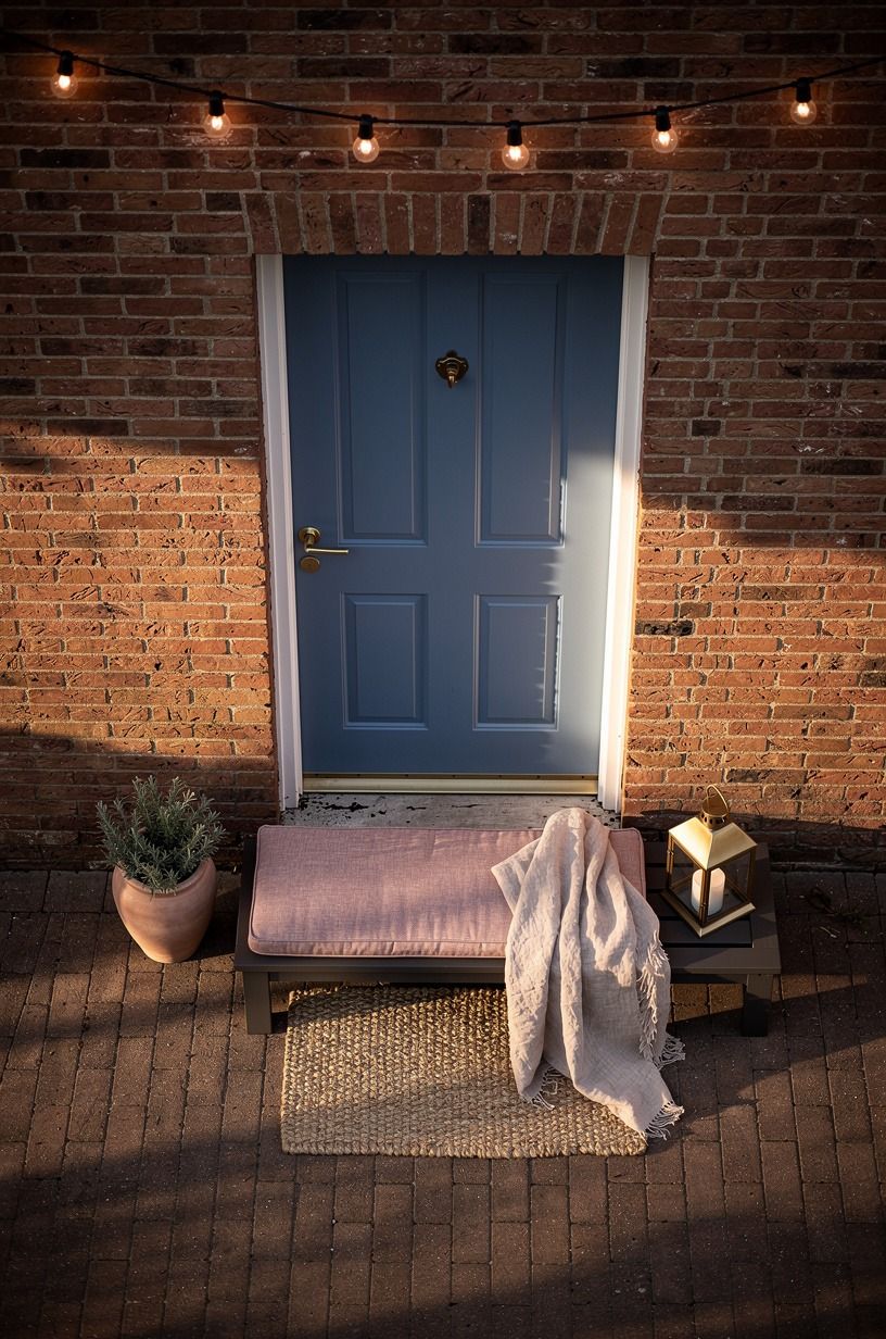 Choose a blue door over a black door for red brick