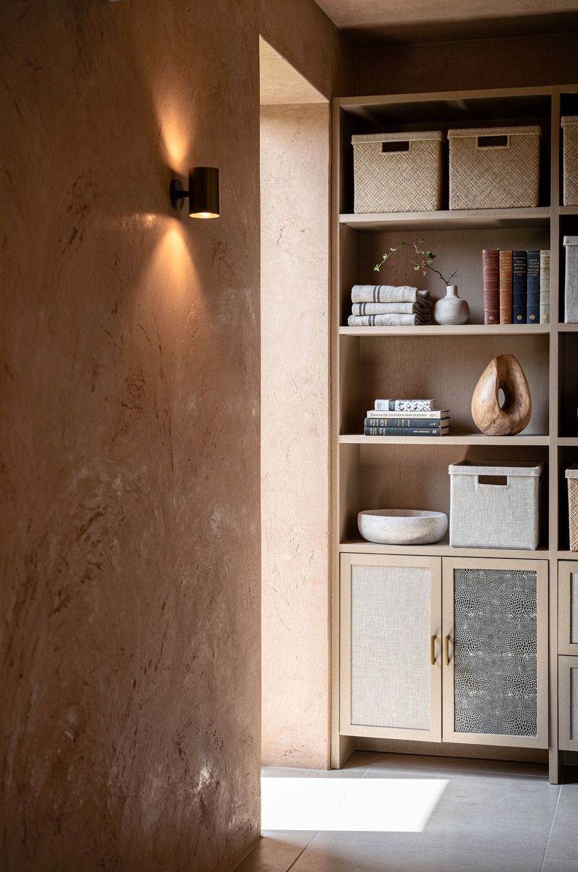 Frame the doorway with shallow hidden cubbies