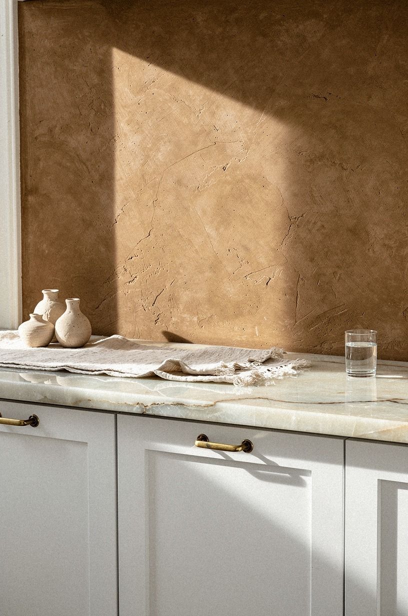 Match white cabinets to cool countertops