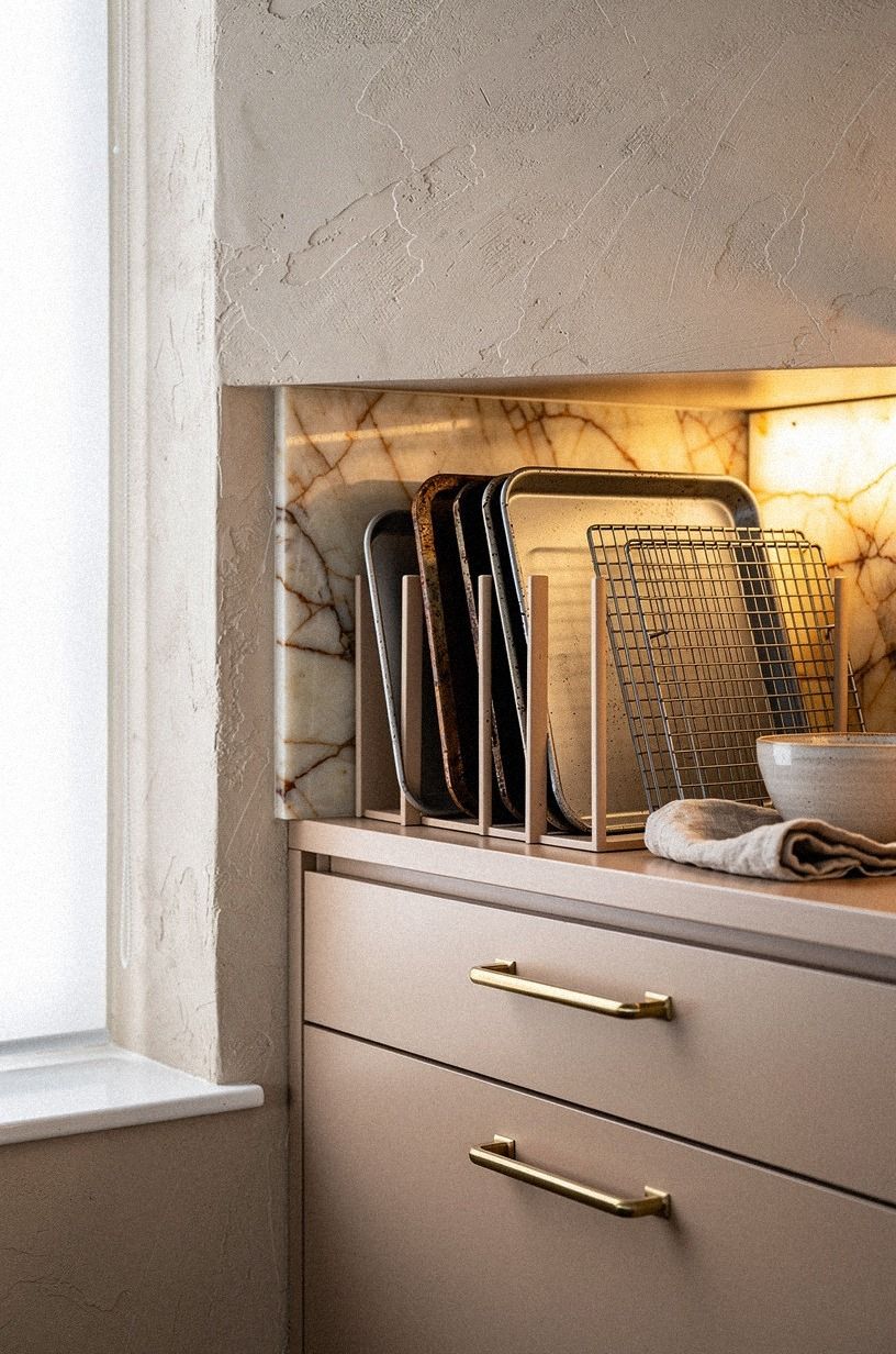 Group baking pans in one lower cabinet