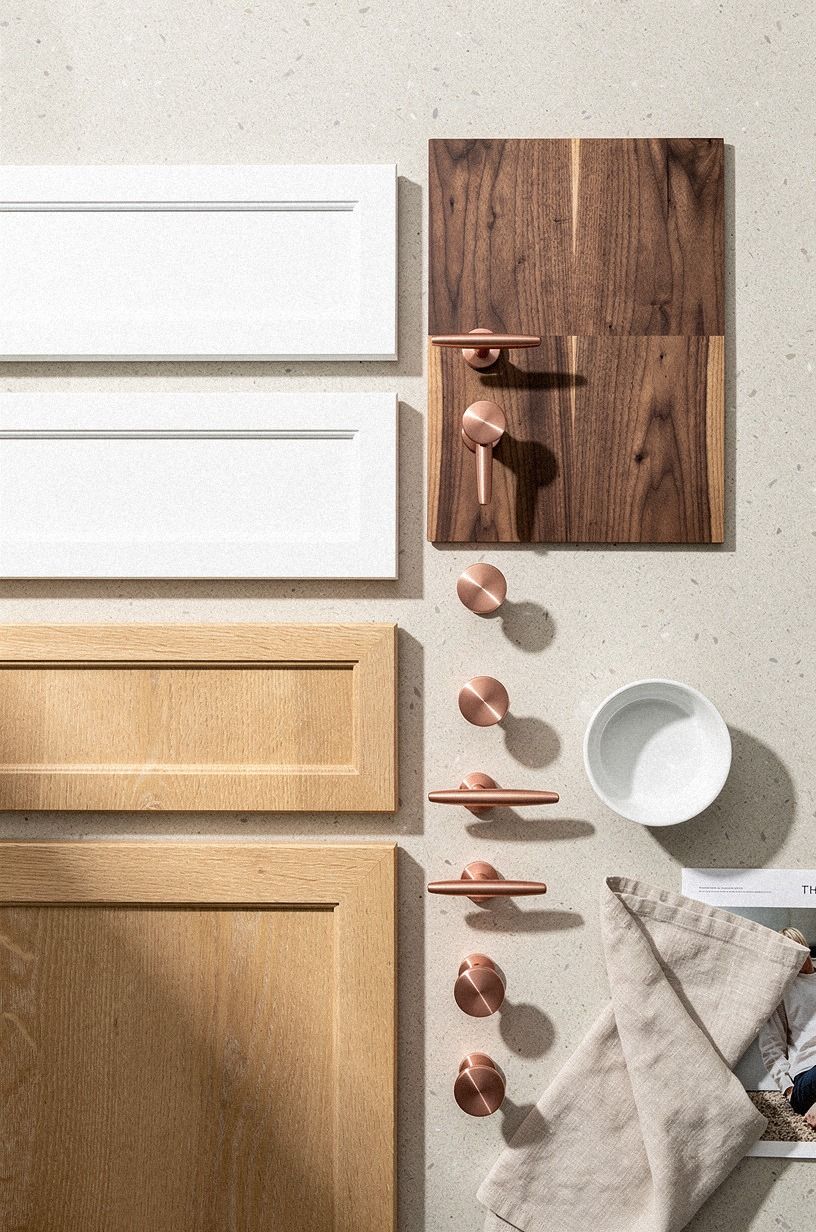 Why do white painted uppers calm a tight kitchen?