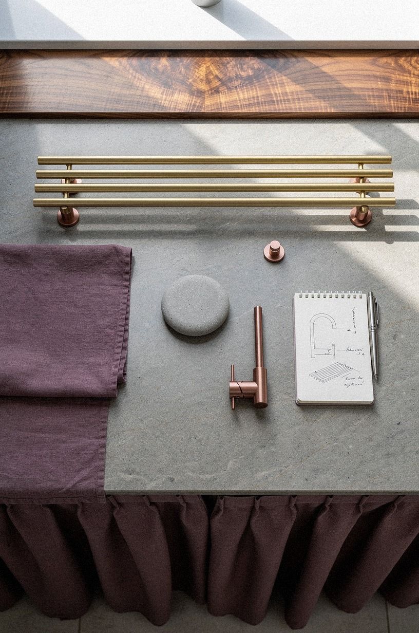 Mount brass rods under the sink cabinet