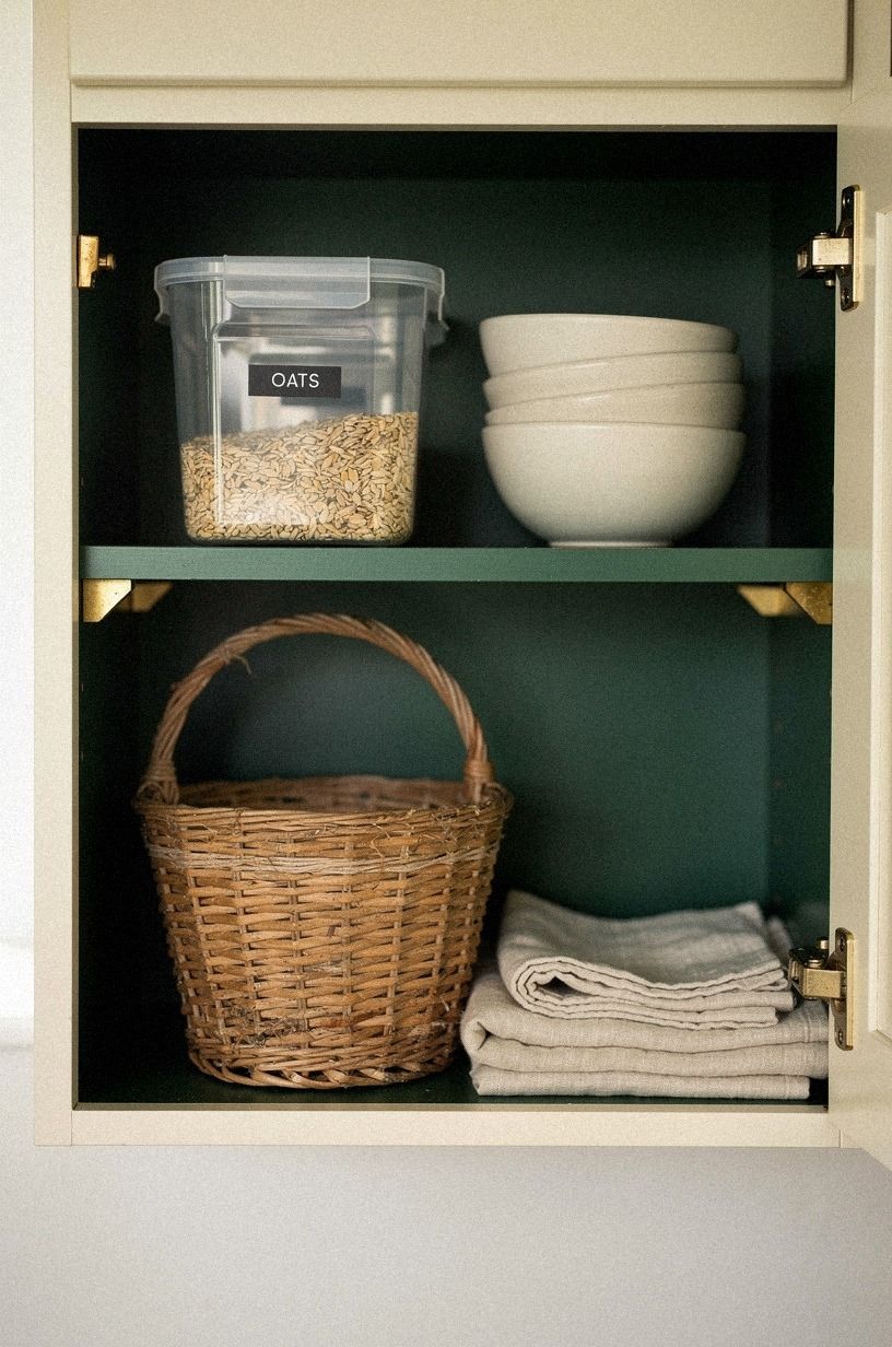 Use clear bins for breakfast cabinet zones