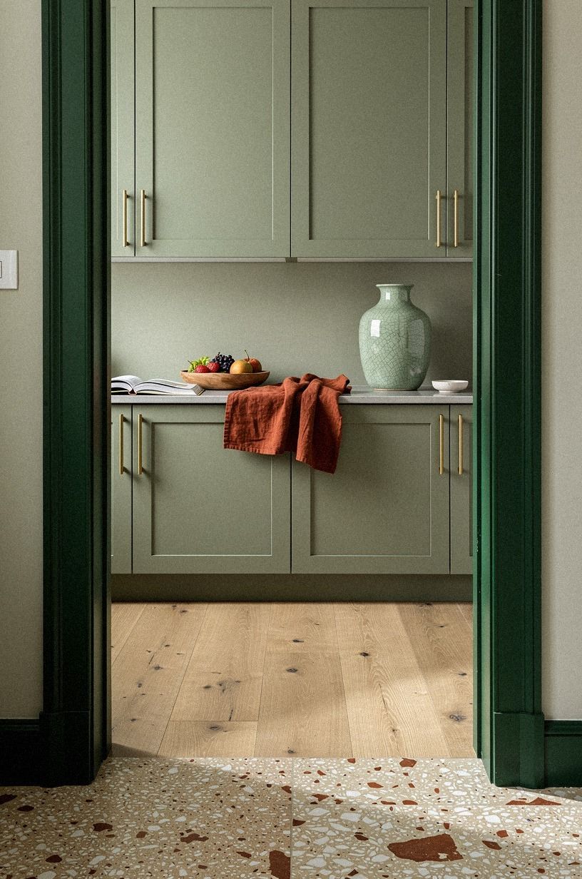 Choose sage green doors with brass pulls