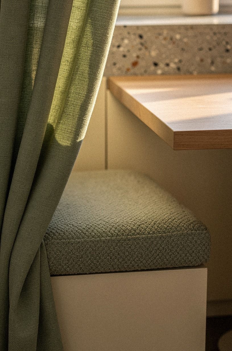 Add cafe curtains behind the breakfast table